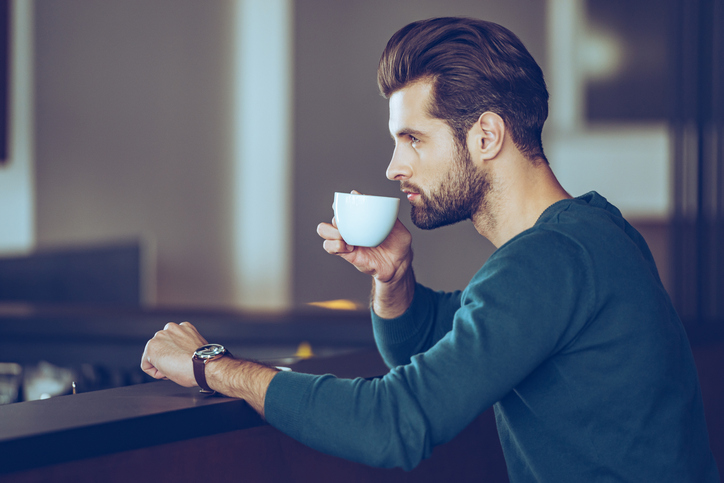 Male drinking coffee